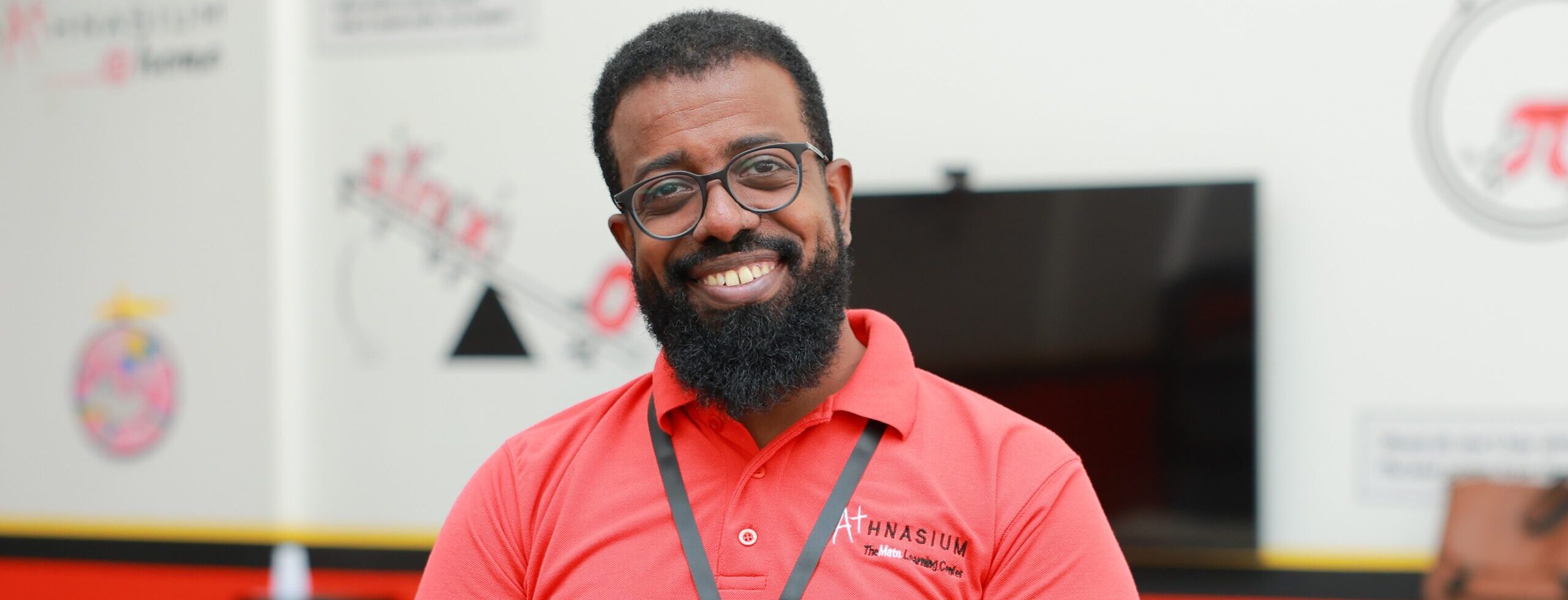 Man in red shirt with beard